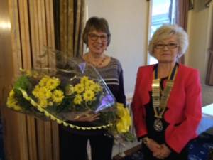 President Gillian Brown presents a bouquet to Chairman of the local Charity Home Start, Mrs Ann Keable